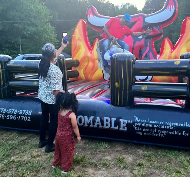 Bull rider waving to the crowd